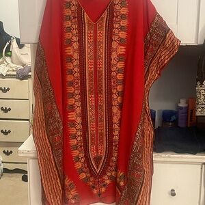 Mainly red V-neck and orange like details and black details